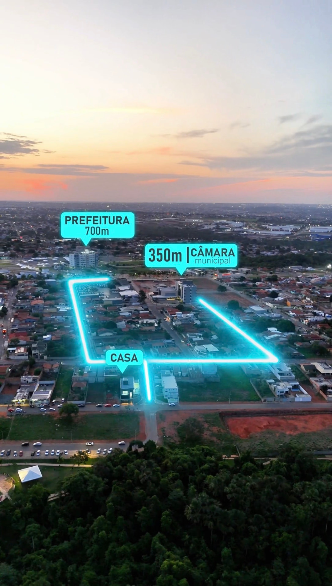 Vista aérea de drone ao entardecer mostrando a casa, a Câmara Municipal e a Prefeitura de Aparecida
